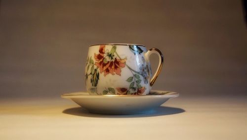 Close-up of tea cup on table