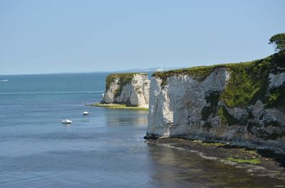 Scenic view of sea against clear sky