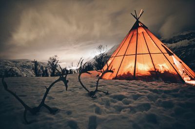 Tent in winter at night