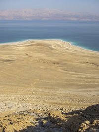 Scenic view of beach against sky masada