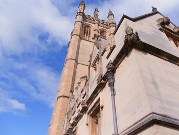 Low angle view of bell tower against sky