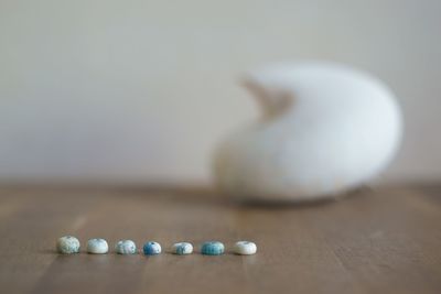 Close-up of candles on table