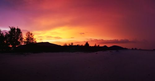 Scenic view of dramatic sky during sunset