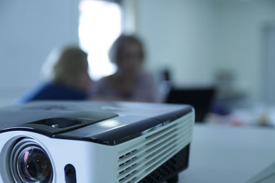 Close-up of camera on table