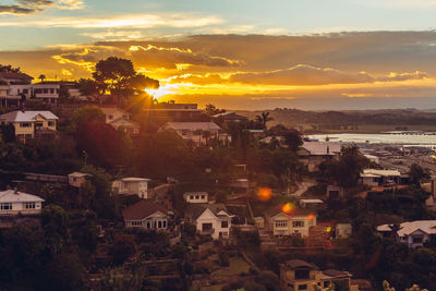 High angle view of cityscape against sky at sunset