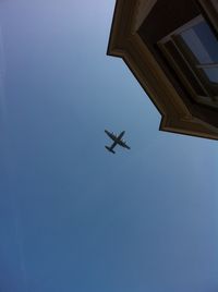 Low angle view of built structure against blue sky