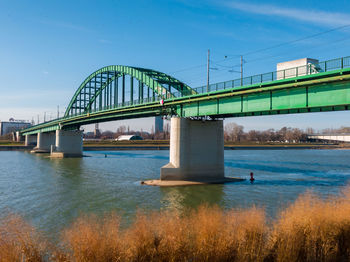 Arch bridge over river