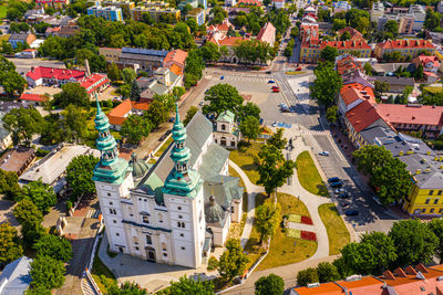 Aerial lowicz old town historical city centre with rynek market square, colorful buildings poland