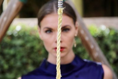Portrait of a young woman in swing