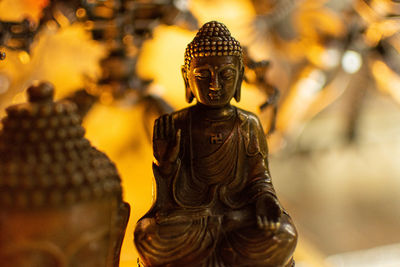 Close-up of statue against temple