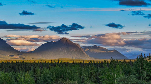 Scenic view of mountains against sky during sunset