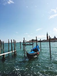 Boats moored in sea