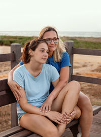 Friends sitting on bench