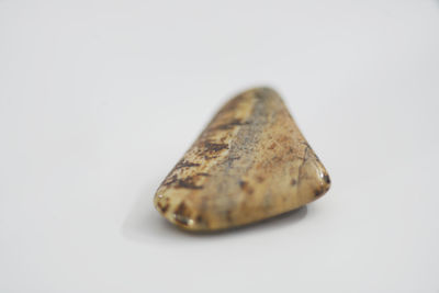 High angle view of bread on white background