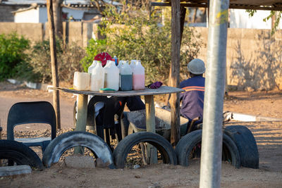 People working at market stall