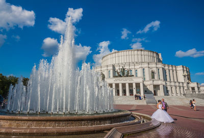 View of fountain against building