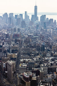 High angle view of buildings in city against sky
