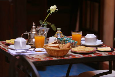 Coffee and cups on table