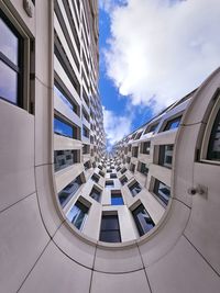 Low angle view of modern building against sky