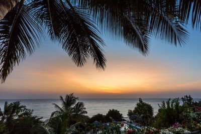 Scenic view of sea against sky at sunset