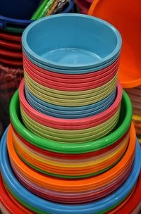 High angle view of multi colored plastic containers at market stall