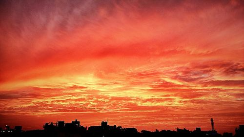 Scenic view of dramatic sky during sunset