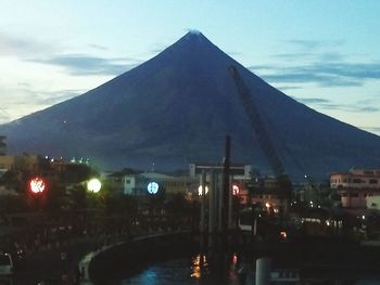 View of illuminated buildings against sky