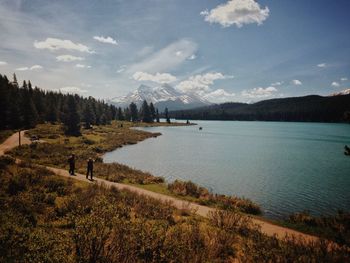 High angle view of people on footpath by lake at jasper national park