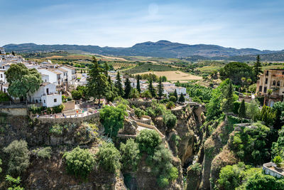 A landscape view of the hills and valleys surrounding the magical mountain town of ronda in spain