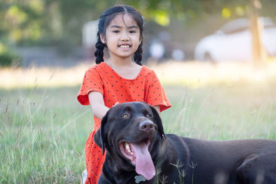 Portrait of a girl with dog