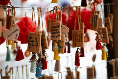 Close-up of lanterns hanging in temple