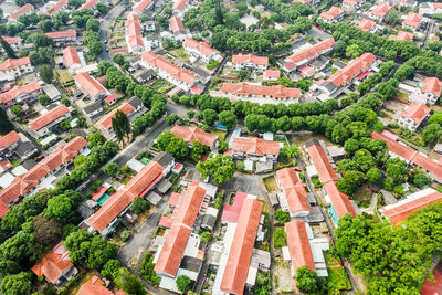 High angle view of street amidst buildings in city