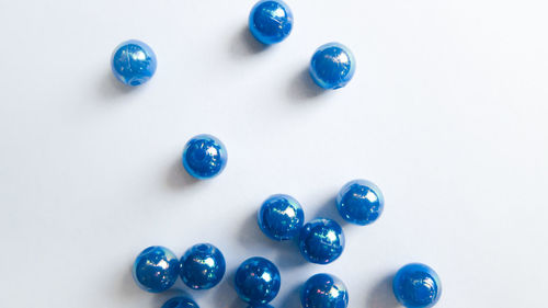 High angle view of blue balls on table