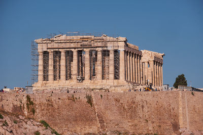 Low angle view of historical building against clear sky