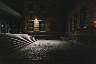 Empty illuminated building at night