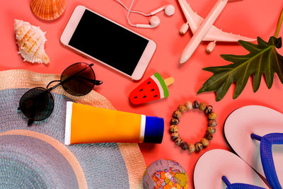 High angle view of sunglasses and laptop on table