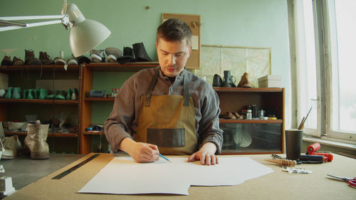 Man working at table