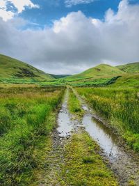 Scenic view of land against sky