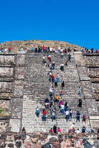 Group of people against the sky