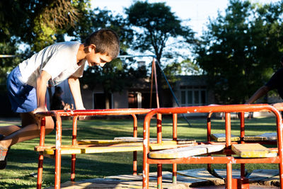 Portrait of boy having fun in playground