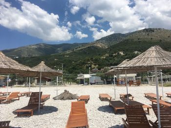 High angle view of chairs on beach