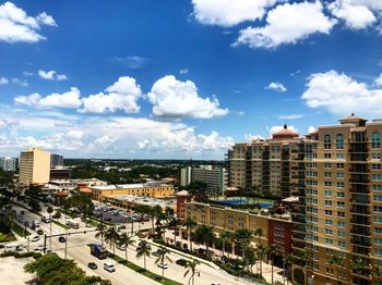 High angle view of buildings in city against sky