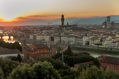 Panoramic view of the city at sunset, view from piazzale michelangelo to river arno,   arnolfo tower