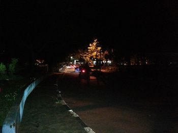 Cars on road at night