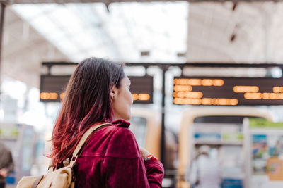 Close-up of woman standing on railroad station