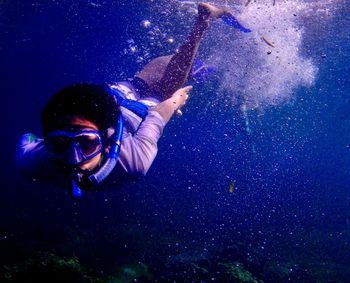 Woman snorkeling undersea