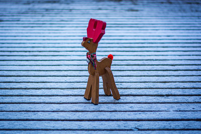 Close-up of toy toys on wood