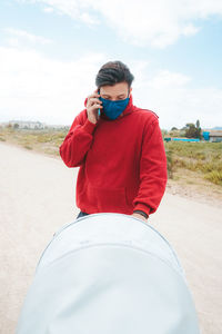 Full length of man on road against sky