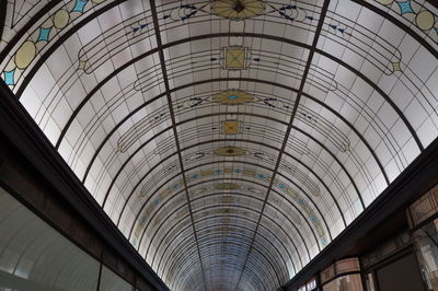 Low angle view of illuminated ceiling in shopping mall
