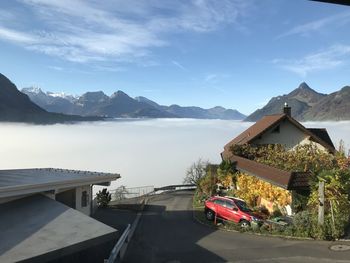 Panoramic view of lake and mountains against sky